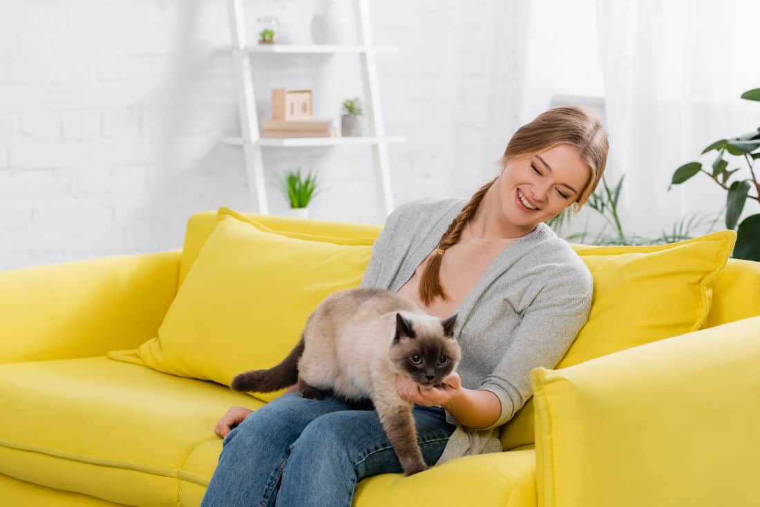 Woman Looking at Cat